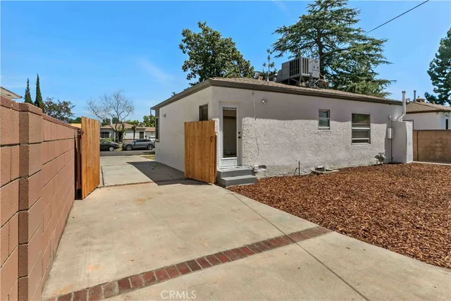 a view of backyard of house