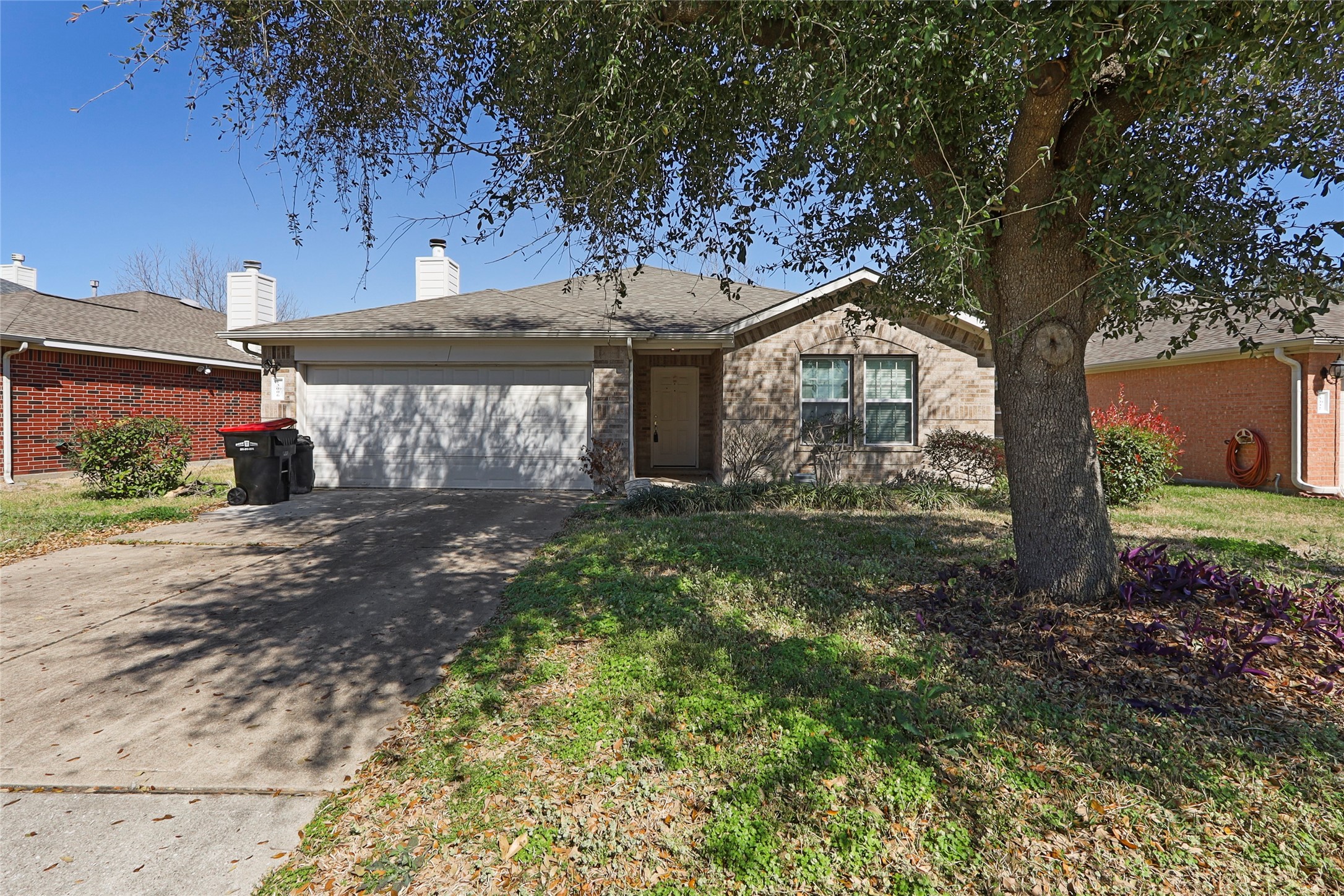 13006 Arden Ridge Lane Houston, TX 77014 - Photo 1 of 11 a front view of a house with garden