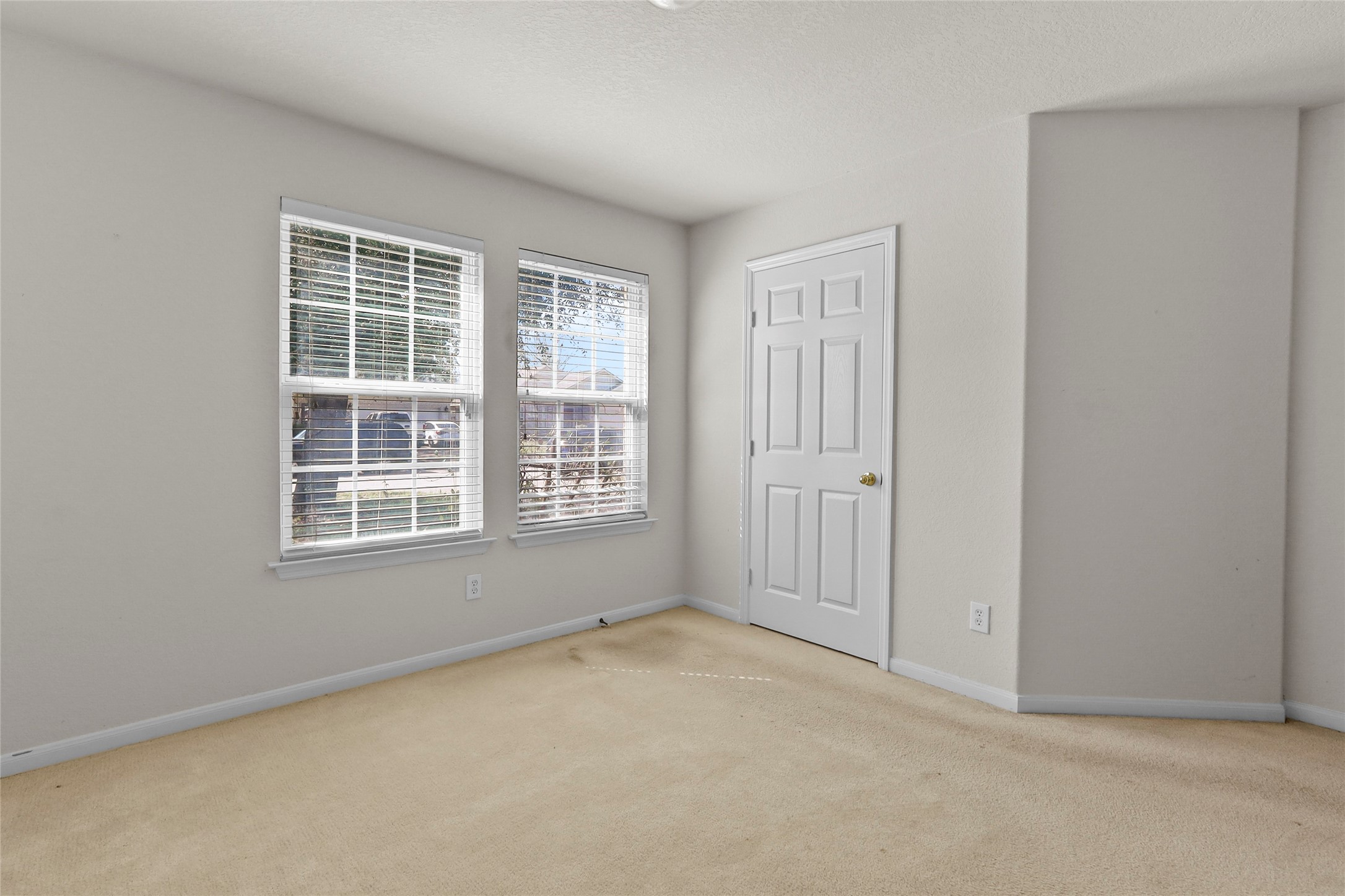 13006 Arden Ridge Lane Houston, TX 77014 - Photo 5 of 11 an empty room with windows