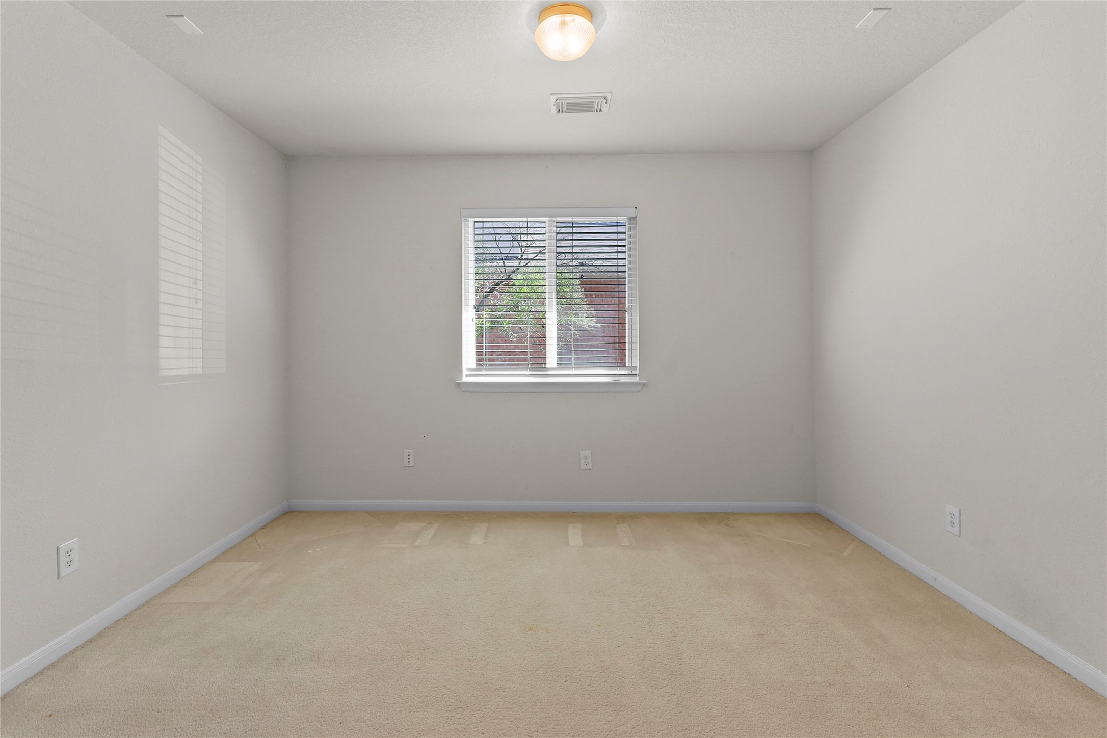 13006 Arden Ridge Lane Houston, TX 77014 - Photo 6 of 11 an empty room with a window