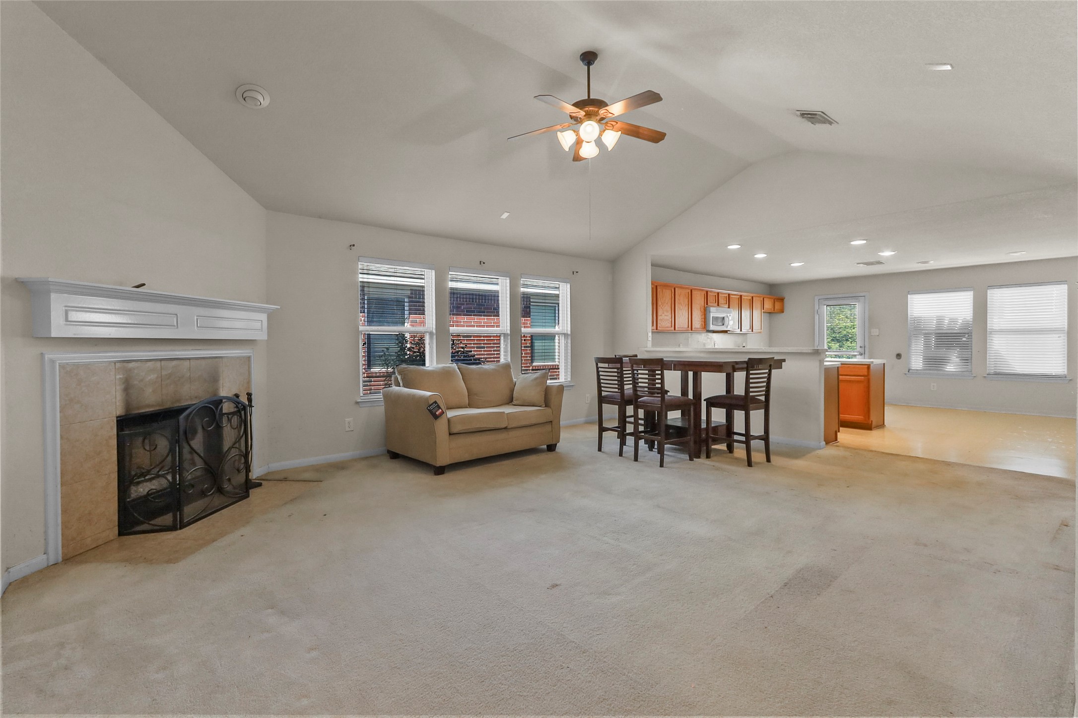 13006 Arden Ridge Lane Houston, TX 77014 - Photo 7 of 11 a living room with furniture and a fireplace