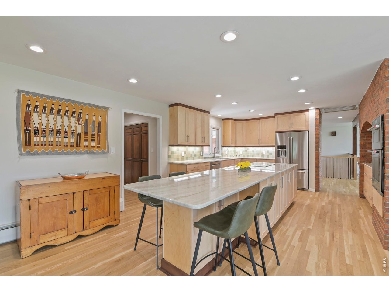 19 Ridge Road Boulder, CO 80303 - Photo 18 of 49 The all new Kitchen is anchored by this endless, gorgeous Taj Mahal Quartzite island.
