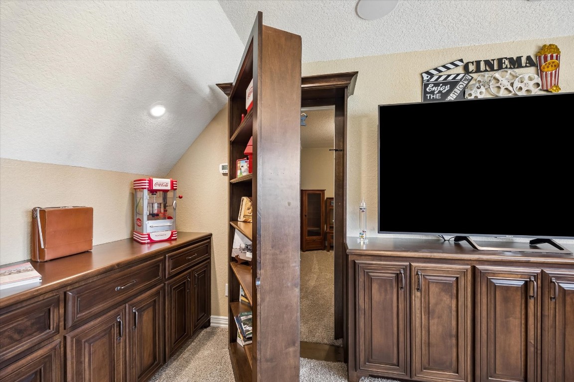 17703 Cedarhill Drive Rosharon, TX 77583 - Photo 26 of 47 One of the most unique features of this home — a cleverly concealed hidden room accessed through a swinging bookcase in the media room. The perfect private space for securing valuables and collections.