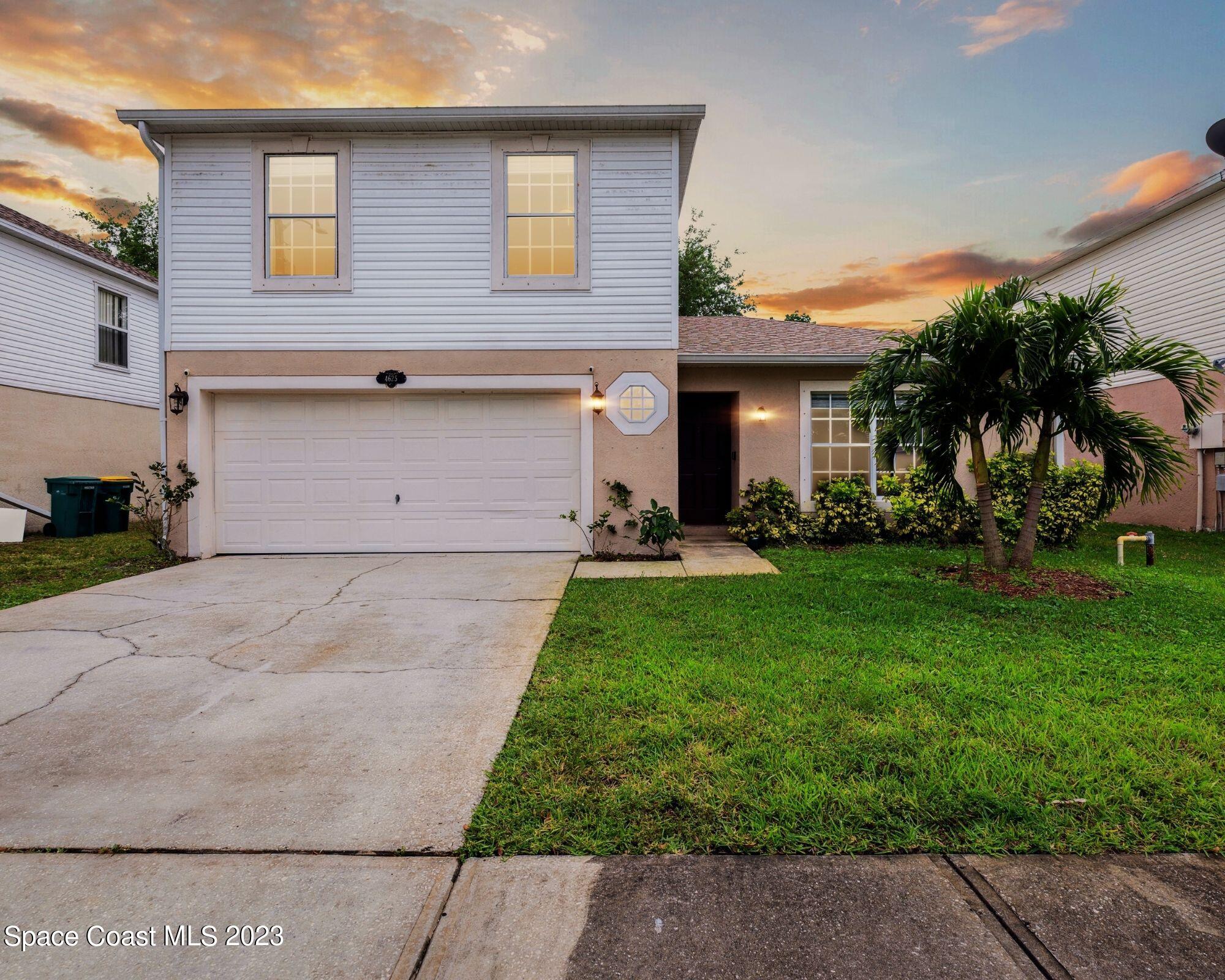 4625 Elena Way Melbourne, FL 32934 - Photo 1 of 26 a house view with a garden space