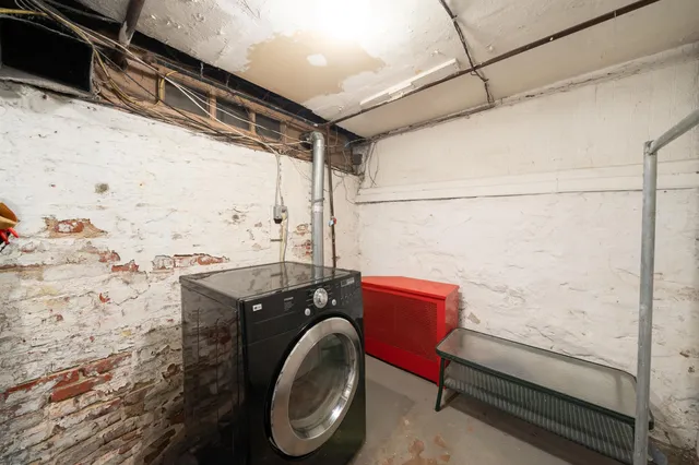 a bathroom with a granite countertop sink a toilet and bathtub