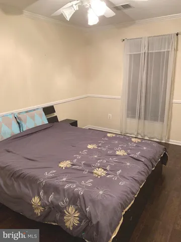 a view of a bed in a room