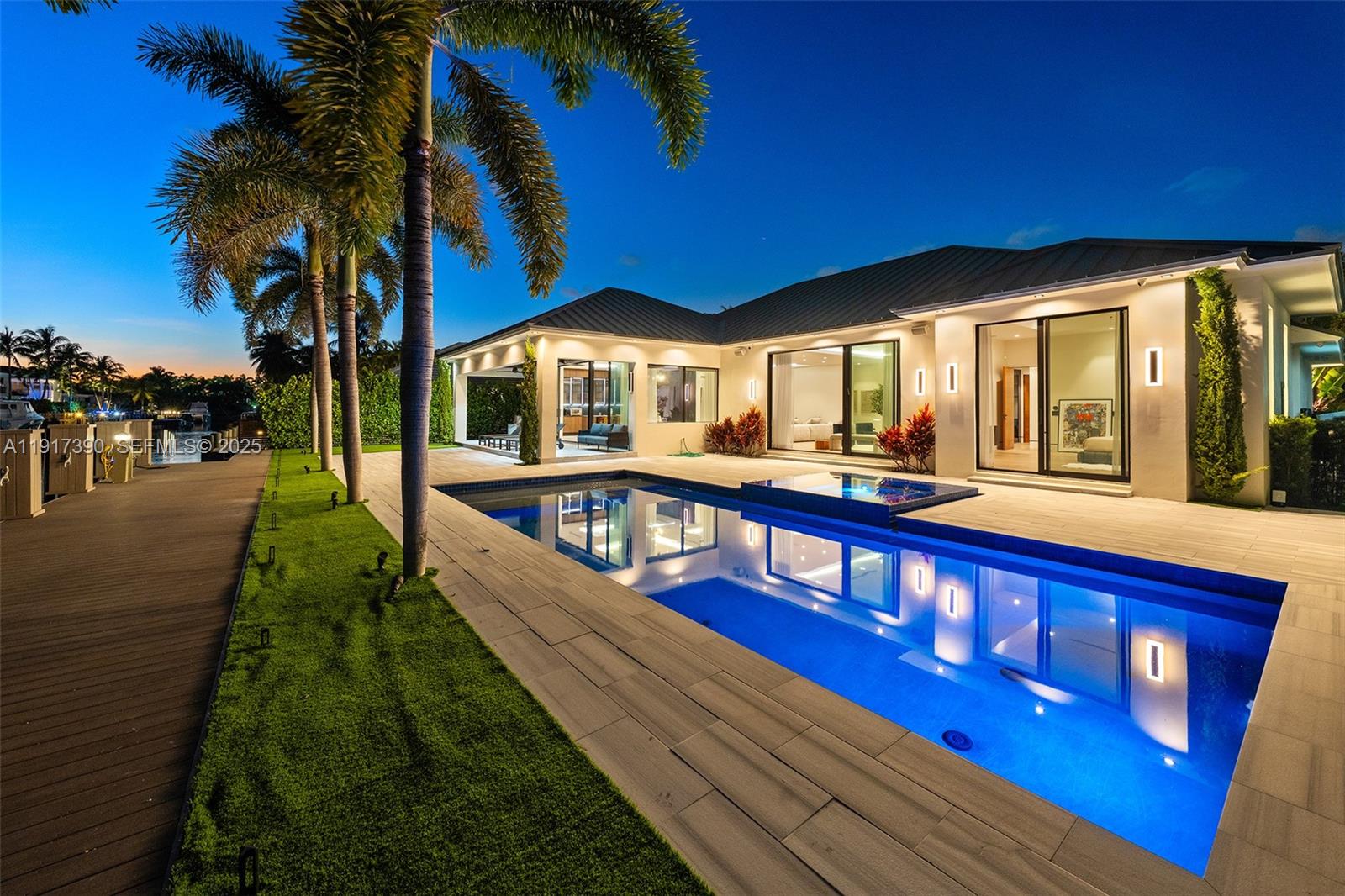 900 Washington Street Hollywood, FL 33019 - Photo 53 of 61 a view of a house with a yard