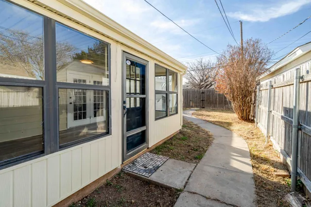 a backyard of a house with lots of green space