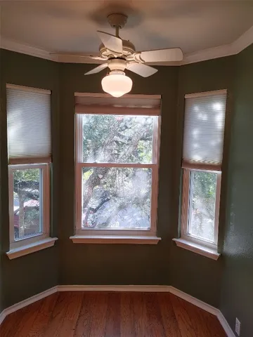 a view of a livingroom with furniture and window