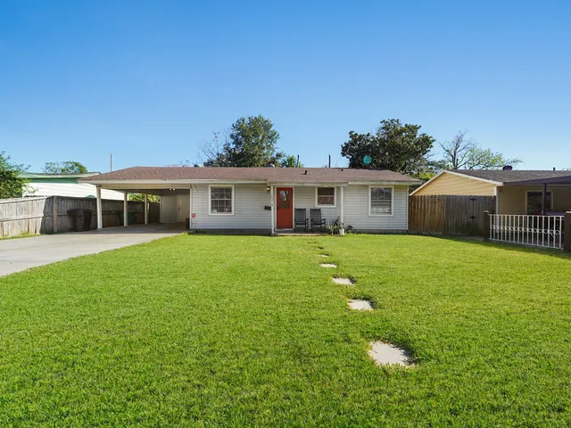 a house view with a garden space