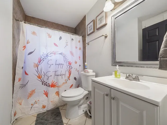 a bathroom with a sink and toilet