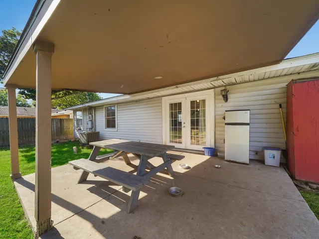 front view of a house with a patio
