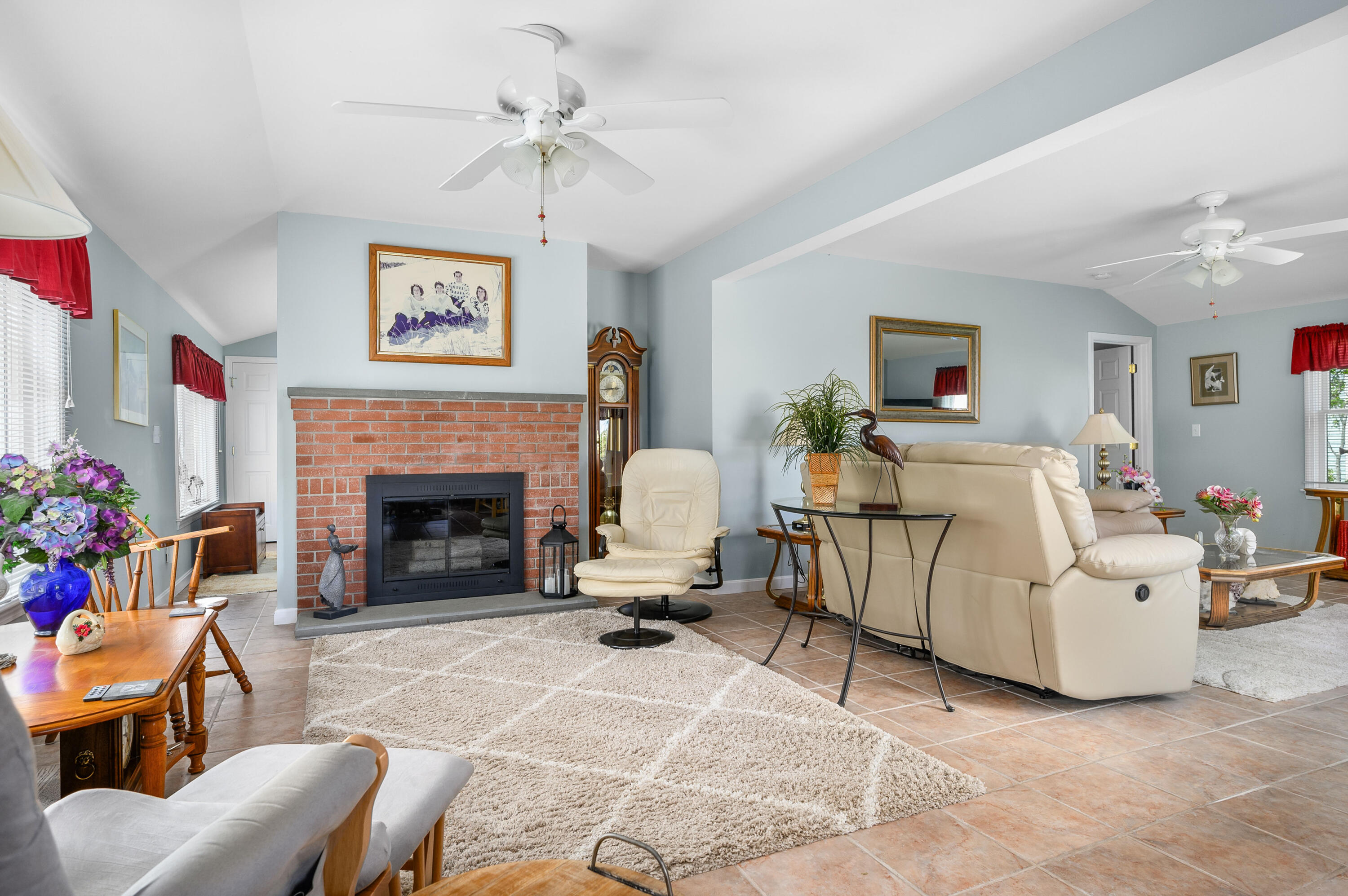 45 First Way Barnstable, MA 02630 - Photo 12 of 30 a living room with furniture and a fireplace