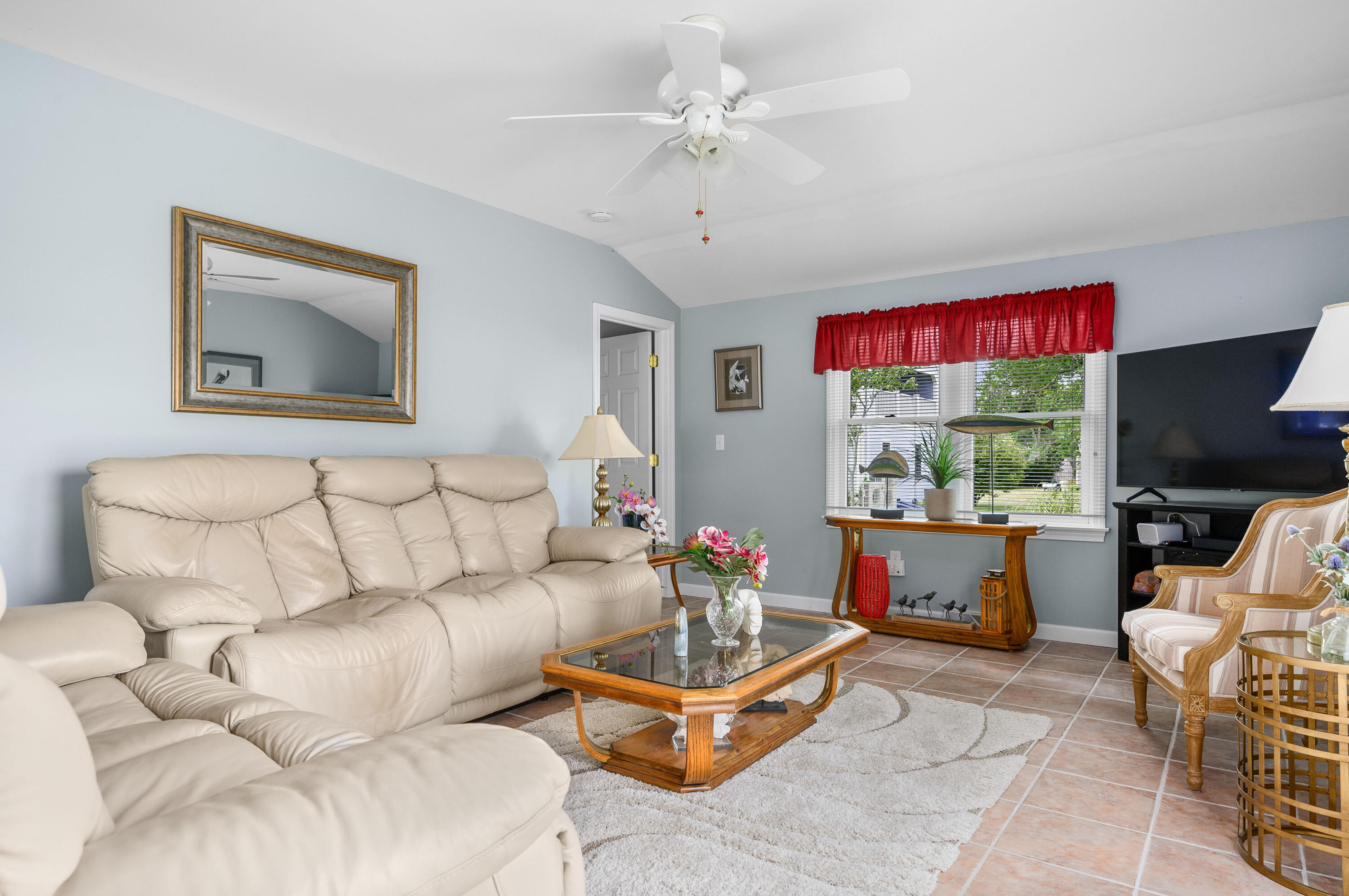 45 First Way Barnstable, MA 02630 - Photo 17 of 30 a living room with furniture and a flat screen tv