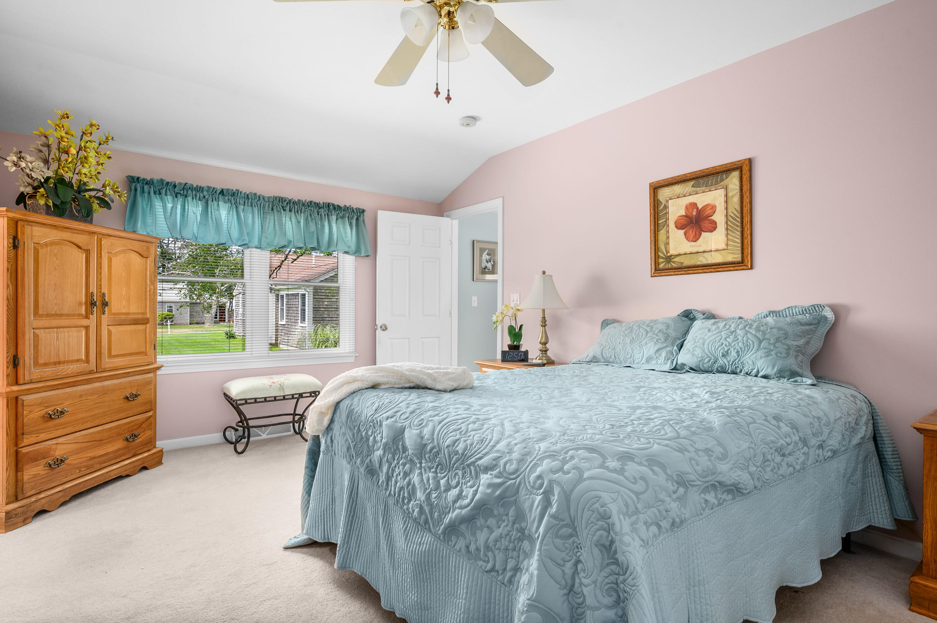 45 First Way Barnstable, MA 02630 - Photo 18 of 30 a bedroom with a bed and a dresser