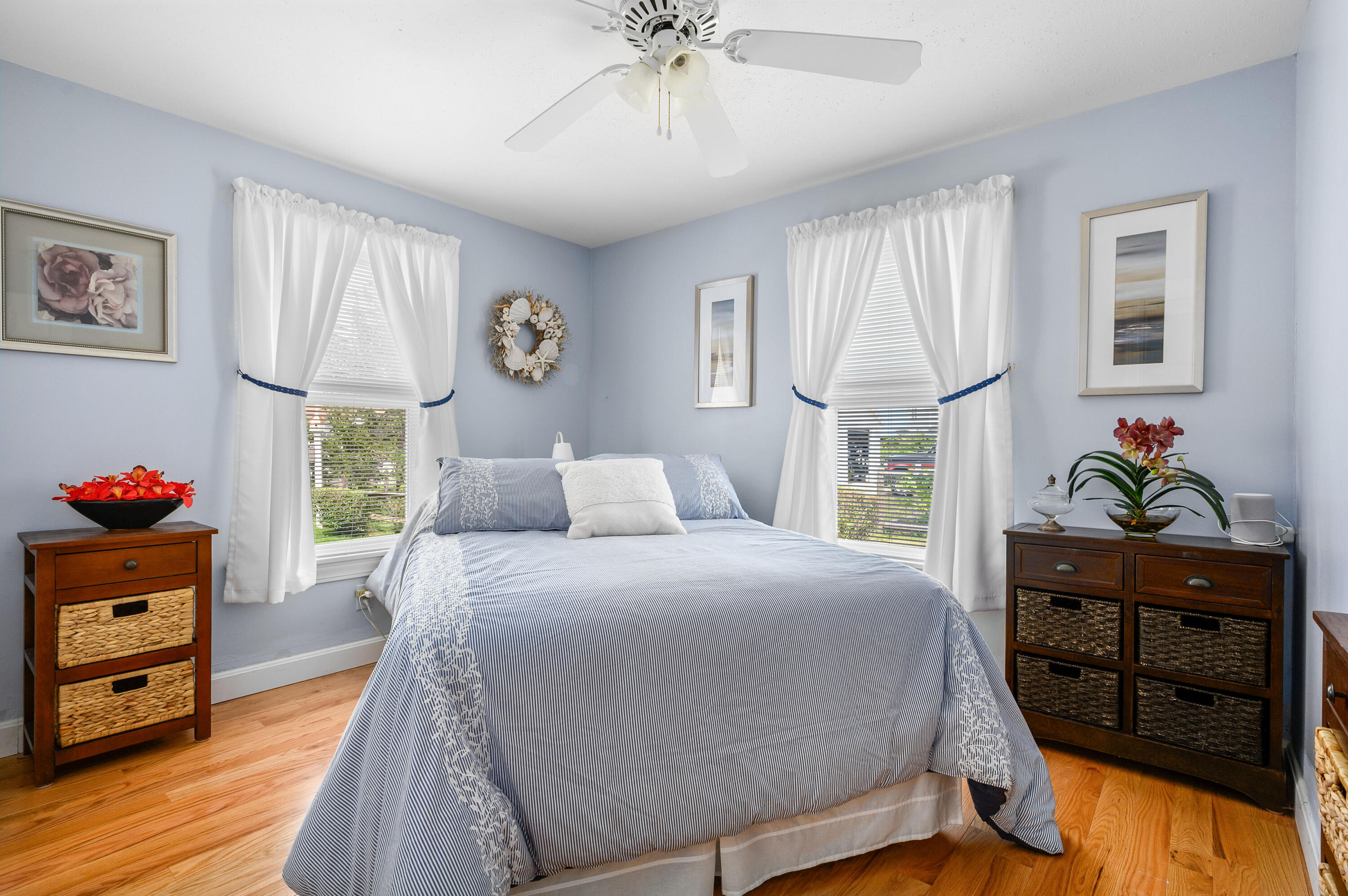 45 First Way Barnstable, MA 02630 - Photo 21 of 30 a bedroom with a bed and a chandelier