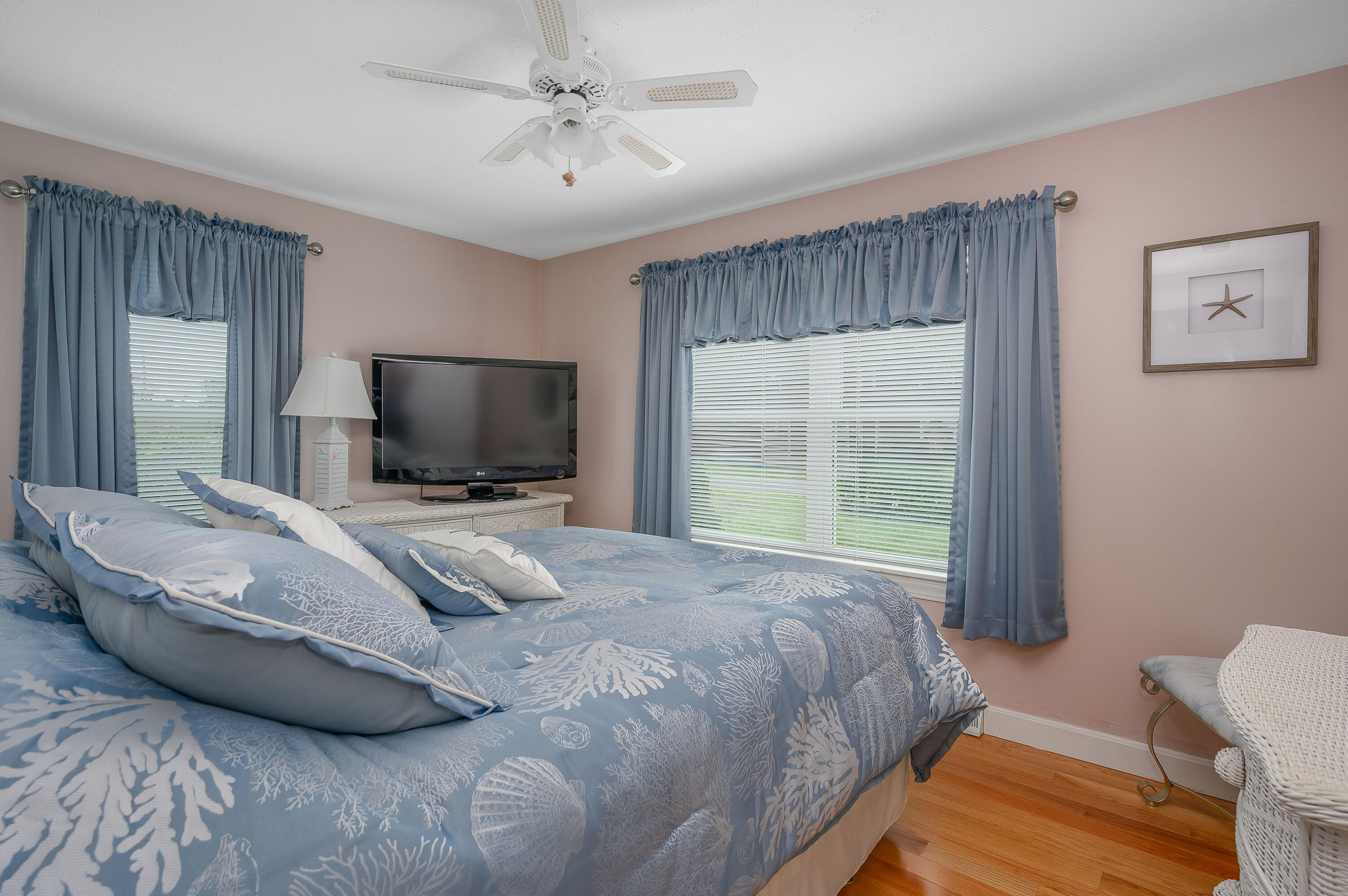45 First Way Barnstable, MA 02630 - Photo 24 of 30 a bedroom with a bed and a flat screen tv