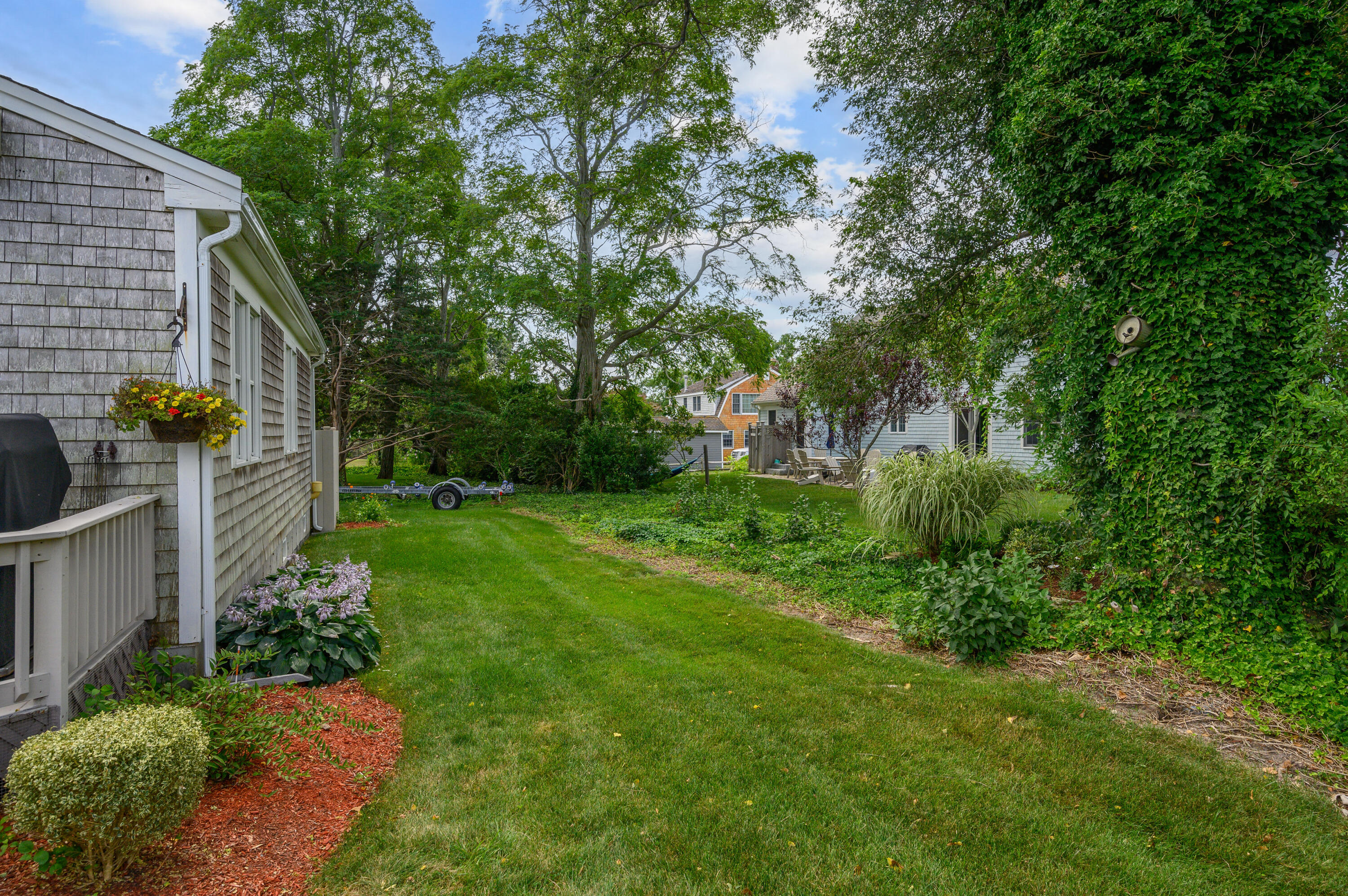 45 First Way Barnstable, MA 02630 - Photo 29 of 30 a view of backyard with outdoor seating and green space