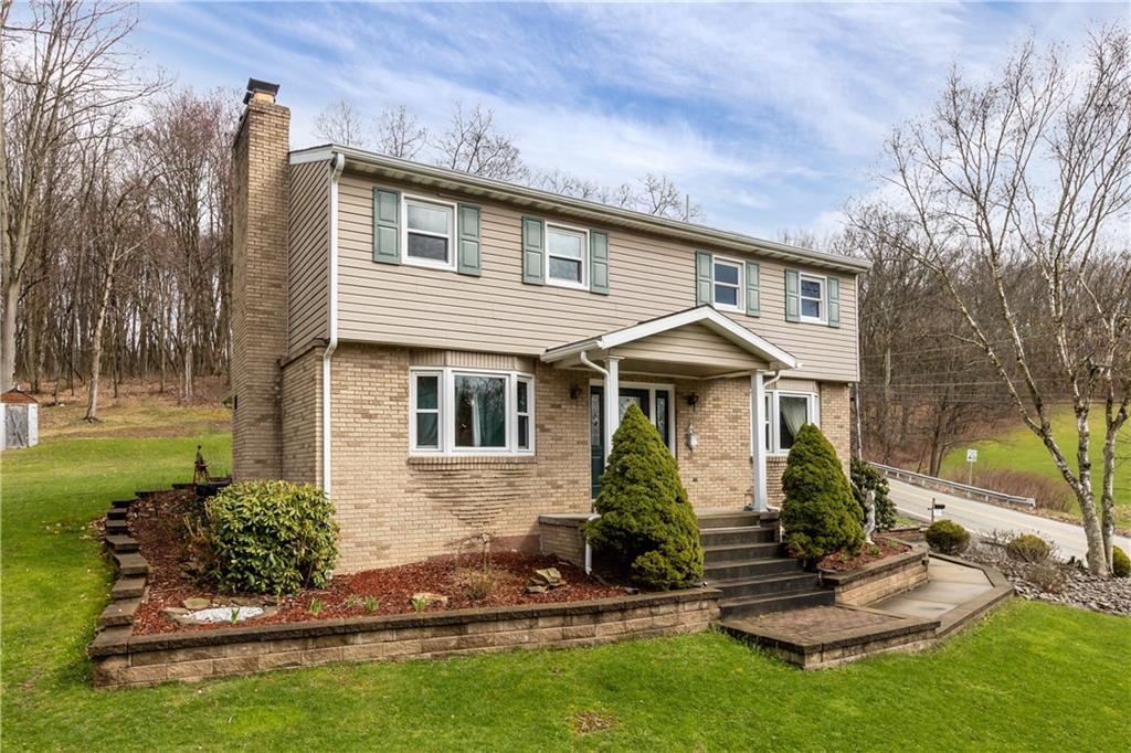 2807 Russelton Road Tarentum, PA 15084 - Photo 2 of 28 a front view of a house with a yard