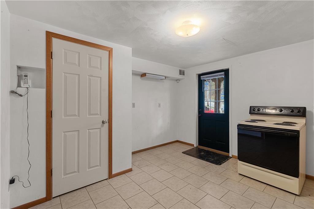 2807 Russelton Road Tarentum, PA 15084 - Photo 7 of 28 a view of kitchen with refrigerator and window