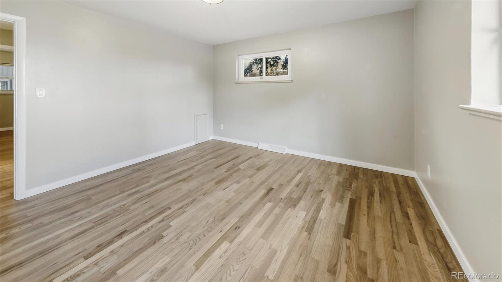 1201 Reed Street Lakewood, CO 80214 - Photo 17 of 44 wooden floor in a empty room