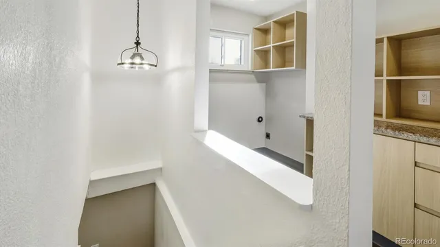 a view of empty room with windows