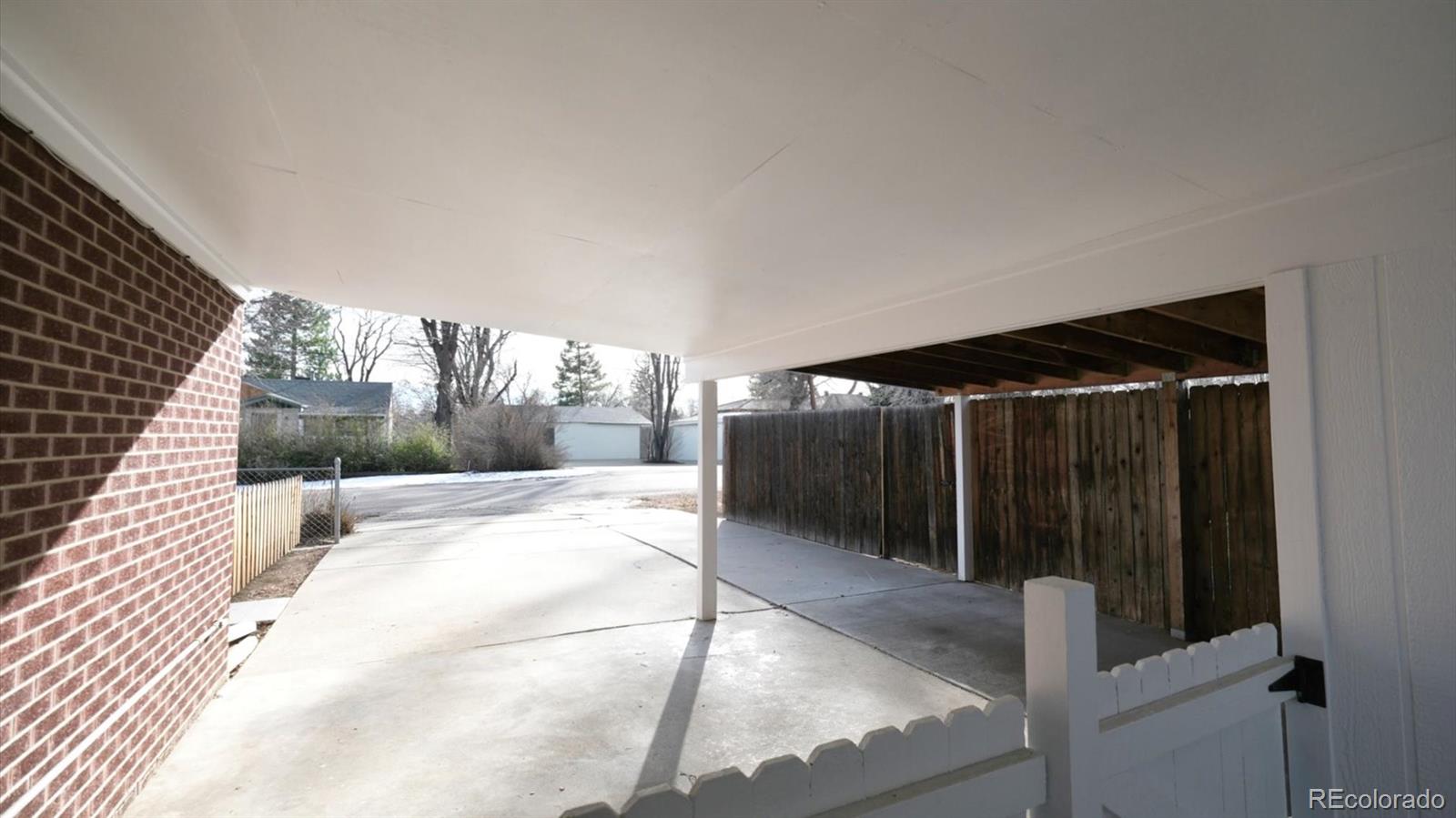 1201 Reed Street Lakewood, CO 80214 - Photo 37 of 44 a view of a living room hardwood and floor to ceiling window