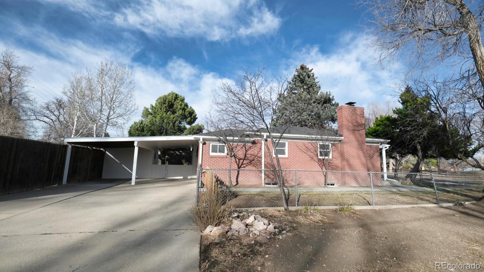 1201 Reed Street Lakewood, CO 80214 - Photo 4 of 44 a view of a backyard