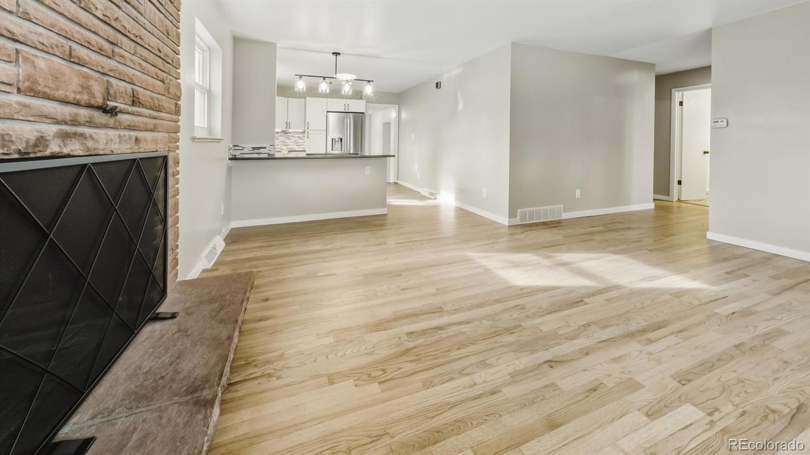 1201 Reed Street Lakewood, CO 80214 - Photo 8 of 44 a view of kitchen and windows