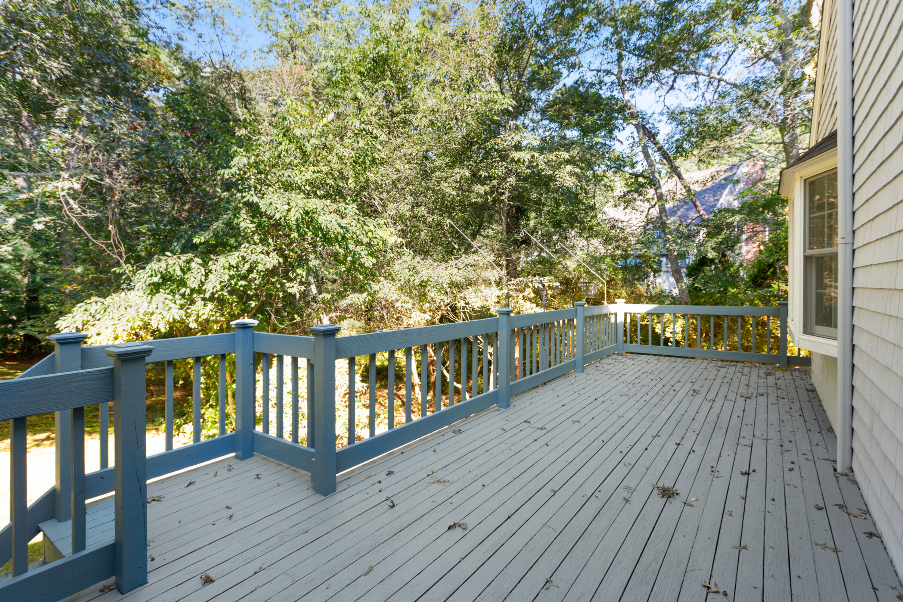 82 Clamshell Cove Road Cotuit, MA 02635 - Photo 33 of 34 a view of deck with wooden floor and fence