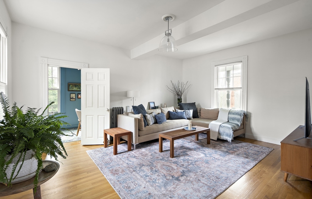 16 Blake Street Cambridge, MA 02140 - Photo 13 of 37 a living room with furniture rug and window