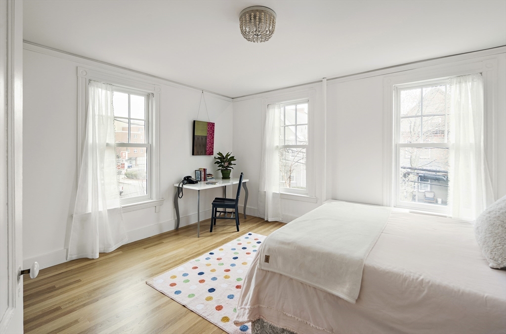 16 Blake Street Cambridge, MA 02140 - Photo 16 of 37 a bedroom with a bed and a window