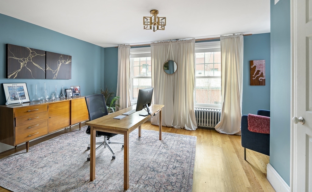 16 Blake Street Cambridge, MA 02140 - Photo 18 of 37 a living room with furniture and a window