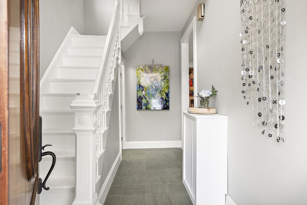 16 Blake Street Cambridge, MA 02140 - Photo 2 of 37 walk in closet with window and flower pot