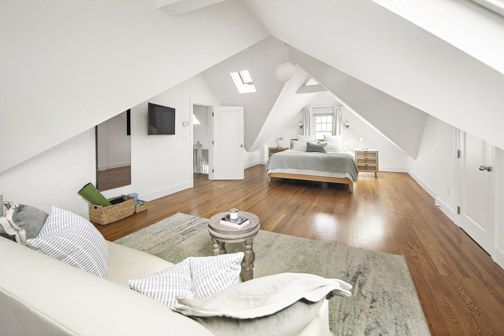 16 Blake Street Cambridge, MA 02140 - Photo 25 of 37 a living room with furniture and a wooden floor