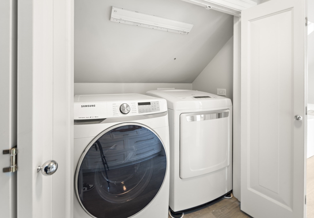 16 Blake Street Cambridge, MA 02140 - Photo 29 of 37 a utility room with dryer and washer