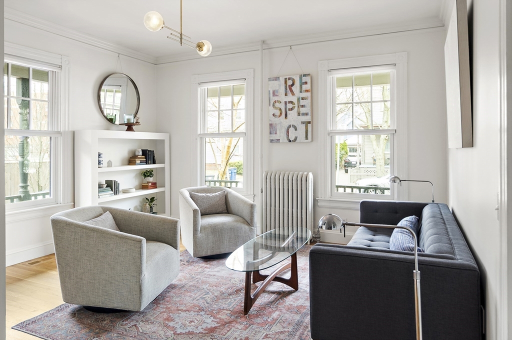 16 Blake Street Cambridge, MA 02140 - Photo 3 of 37 a living room with furniture and a large window