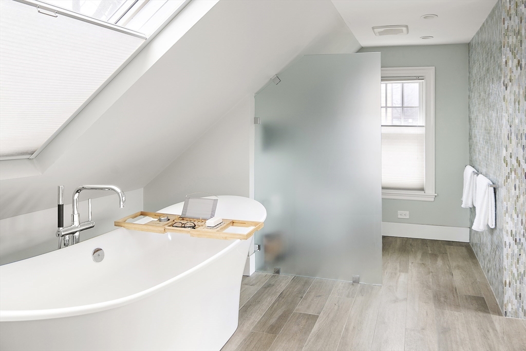 16 Blake Street Cambridge, MA 02140 - Photo 32 of 37 a bathroom with a sink and a window