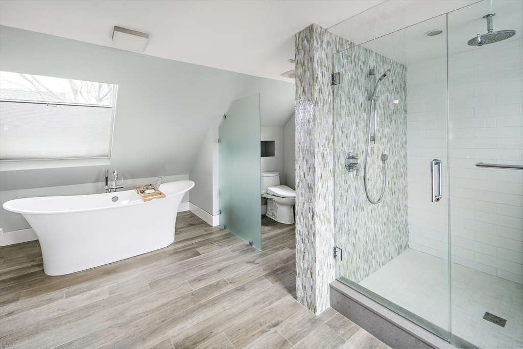 16 Blake Street Cambridge, MA 02140 - Photo 33 of 37 a bathroom with a bathtub and a shower