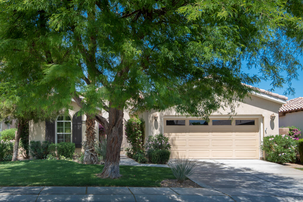 81820 Eagle Claw Drive La Quinta, CA 92253 - Photo 2 of 36 front view of a house with a small yard