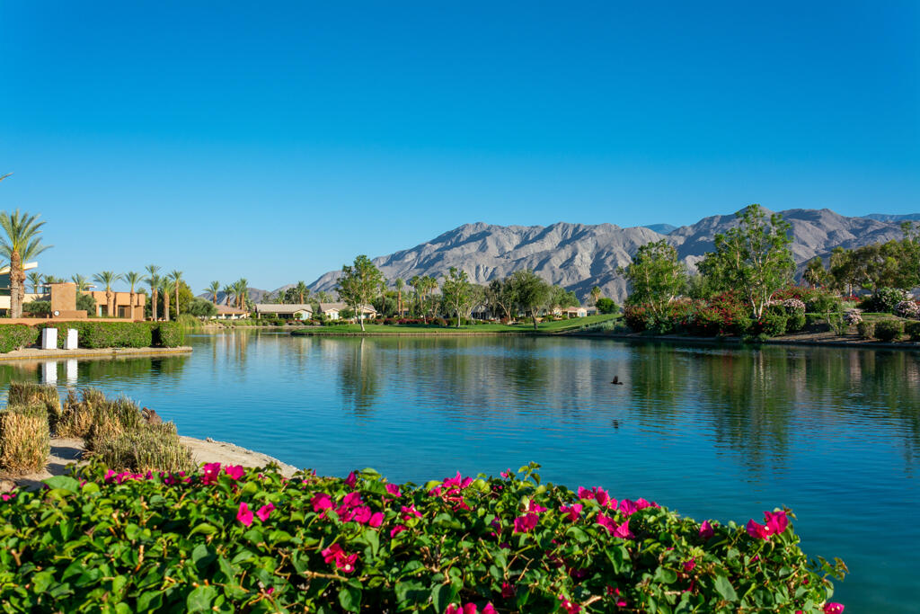 81820 Eagle Claw Drive La Quinta, CA 92253 - Photo 29 of 36 a view of a lake with a garden