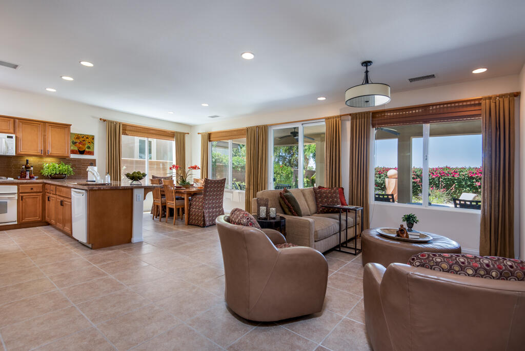 81820 Eagle Claw Drive La Quinta, CA 92253 - Photo 4 of 36 a living room with furniture and a floor to ceiling window