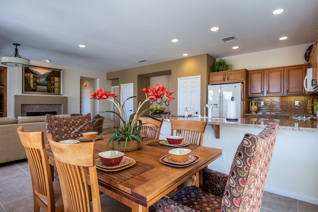 81820 Eagle Claw Drive La Quinta, CA 92253 - Photo 6 of 36 a view of a dining room with furniture
