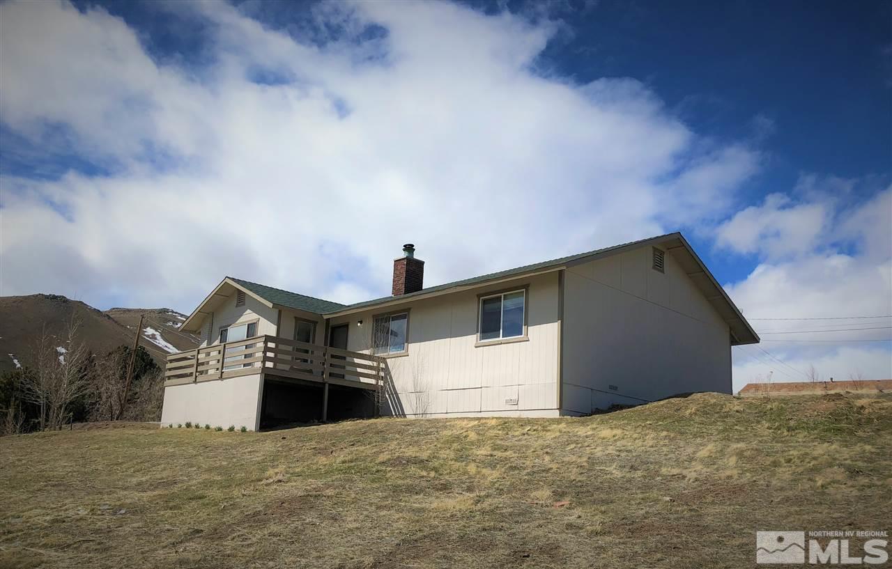 10440 San Fernando Road Reno, NV 89508 - Photo 12 of 24 a view of a house with a garage