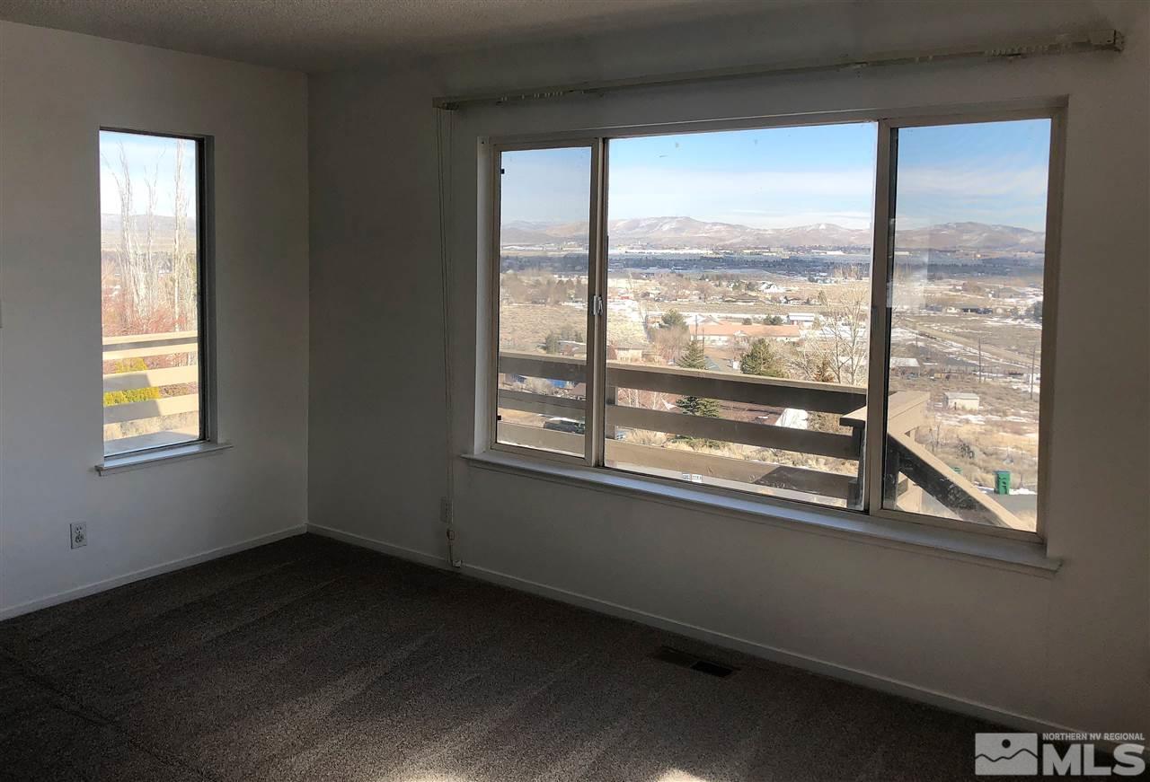 10440 San Fernando Road Reno, NV 89508 - Photo 13 of 24 a view of an empty room with a window