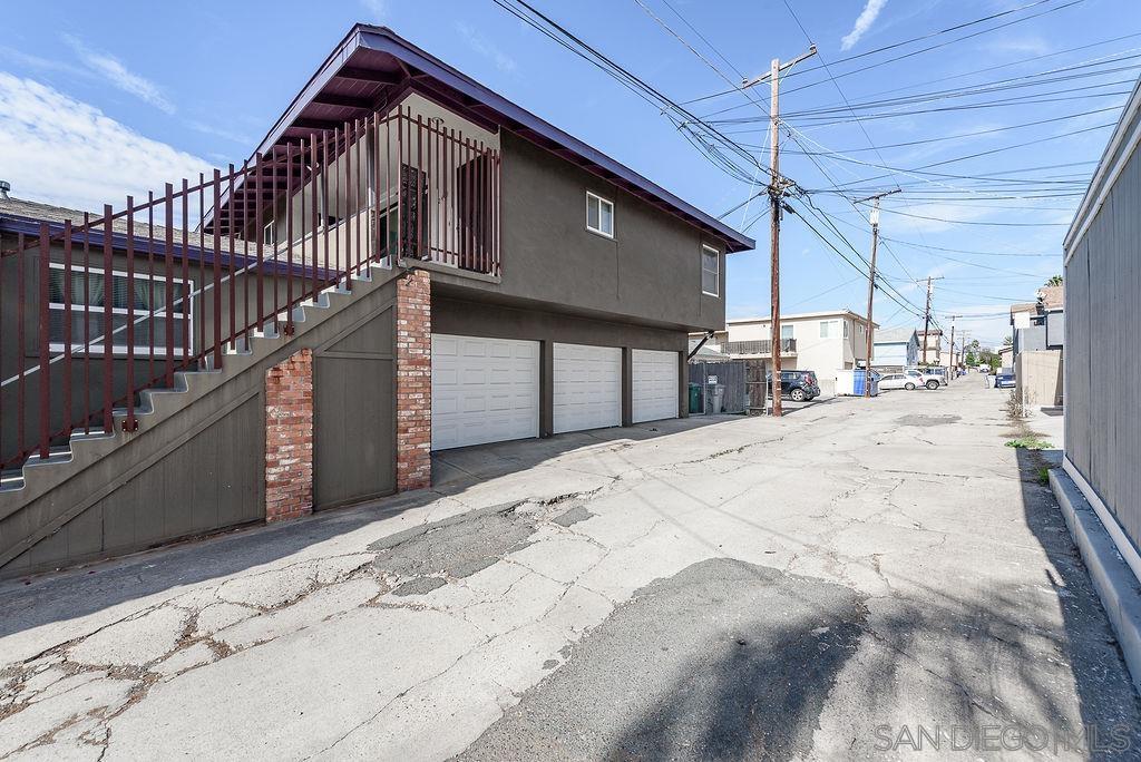 2414 Monroe Avenue San Diego, CA 92116 - Photo 2 of 65 a view of a house with a wooden fence