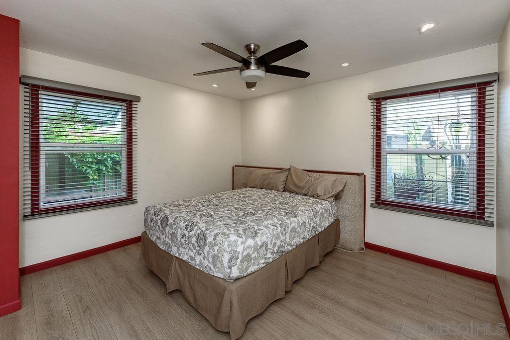 2414 Monroe Avenue San Diego, CA 92116 - Photo 23 of 65 a bedroom with a bed and window