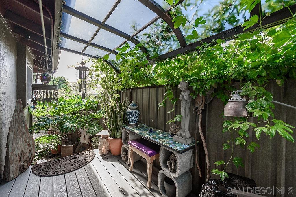 2414 Monroe Avenue San Diego, CA 92116 - Photo 27 of 65 a backyard of a house with outdoor seating