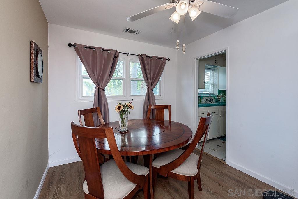 2414 Monroe Avenue San Diego, CA 92116 - Photo 49 of 65 a view of a dining room with furniture and window