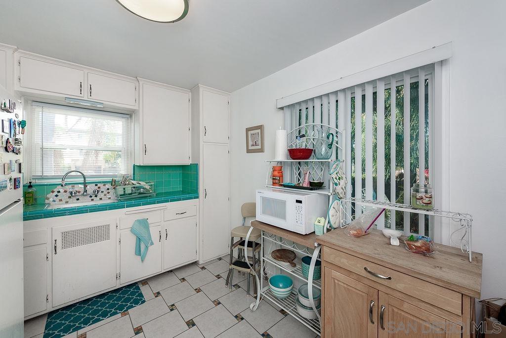 2414 Monroe Avenue San Diego, CA 92116 - Photo 52 of 65 a room with storage and utility